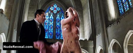 CHARLIZE THERON nude in Devil’s Advocate