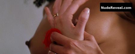 TAMARA TUNIE nude in Devil’s Advocate