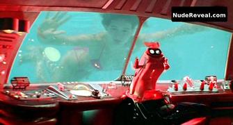 GEENA DAVIS nude in Earth Girls Are Easy