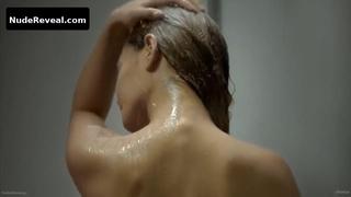 LOVI POE nude in The Escort
