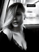 ELIZABETH OLSEN nude in Captain America: Civil War