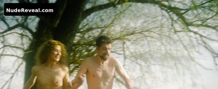 ROSAMUND PIKE nude in Radioactive