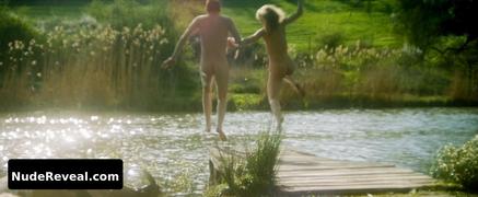 ROSAMUND PIKE nude in Radioactive