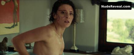 JASMINE TRINCA nude in The Gunman