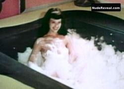 BETTIE PAGE nude in Bettie Page: The Girl in the Leopard Print Bikini