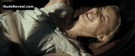 SARAH GADON nude in American Woman