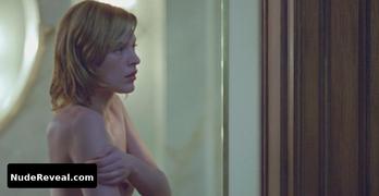 MILLA JOVOVICH nude in Resident Evil