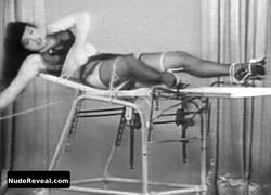 BETTIE PAGE nude in Bettie Page: The Girl in the Leopard Print Bikini