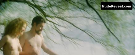 ROSAMUND PIKE nude in Radioactive