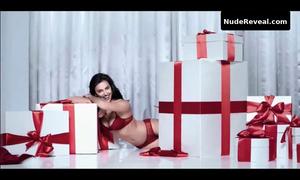 IRINA SHAYK nude in Intimissimi