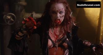 MELINDA CLARKE nude in Return of the Living Dead Part III
