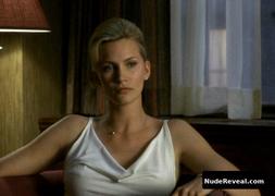 NATASHA HENSTRIDGE nude in The Whole Nine Yards