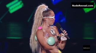 MILEY CYRUS nude in MTV Video Music Awards