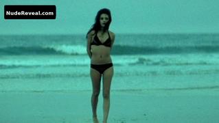MILA KUNIS nude in Moving McAllister