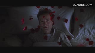 MENA SUVARI nude in American Beauty