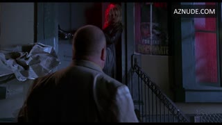 PAMELA ANDERSON nude in Barb Wire