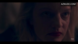 ELISABETH MOSS nude in The Handmaid’s Tale