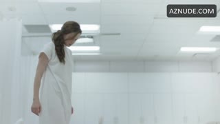 ALEXIS BLEDEL nude in The Handmaid’s Tale