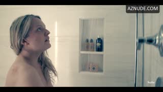 ELISABETH MOSS nude in The Handmaid’s Tale