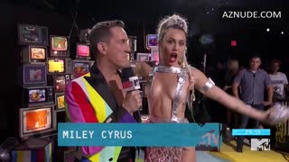 MILEY CYRUS nude in MTV Video Music Awards