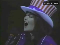 LUCY LAWLESS nude in Detroit Red Wings Game: National Anthem