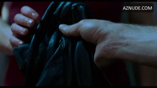 MILLA JOVOVICH nude in Resident Evil