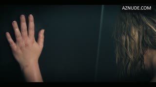 ELISABETH MOSS nude in The Veil