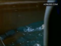 EMMANUELLE SEIGNER nude in Backstage