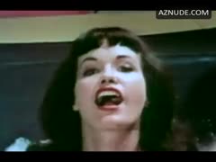 BETTIE PAGE nude in Bettie Page: The Girl in the Leopard Print Bikini