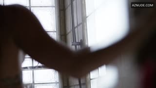 BRIANA EVIGAN nude in Puncture Wounds